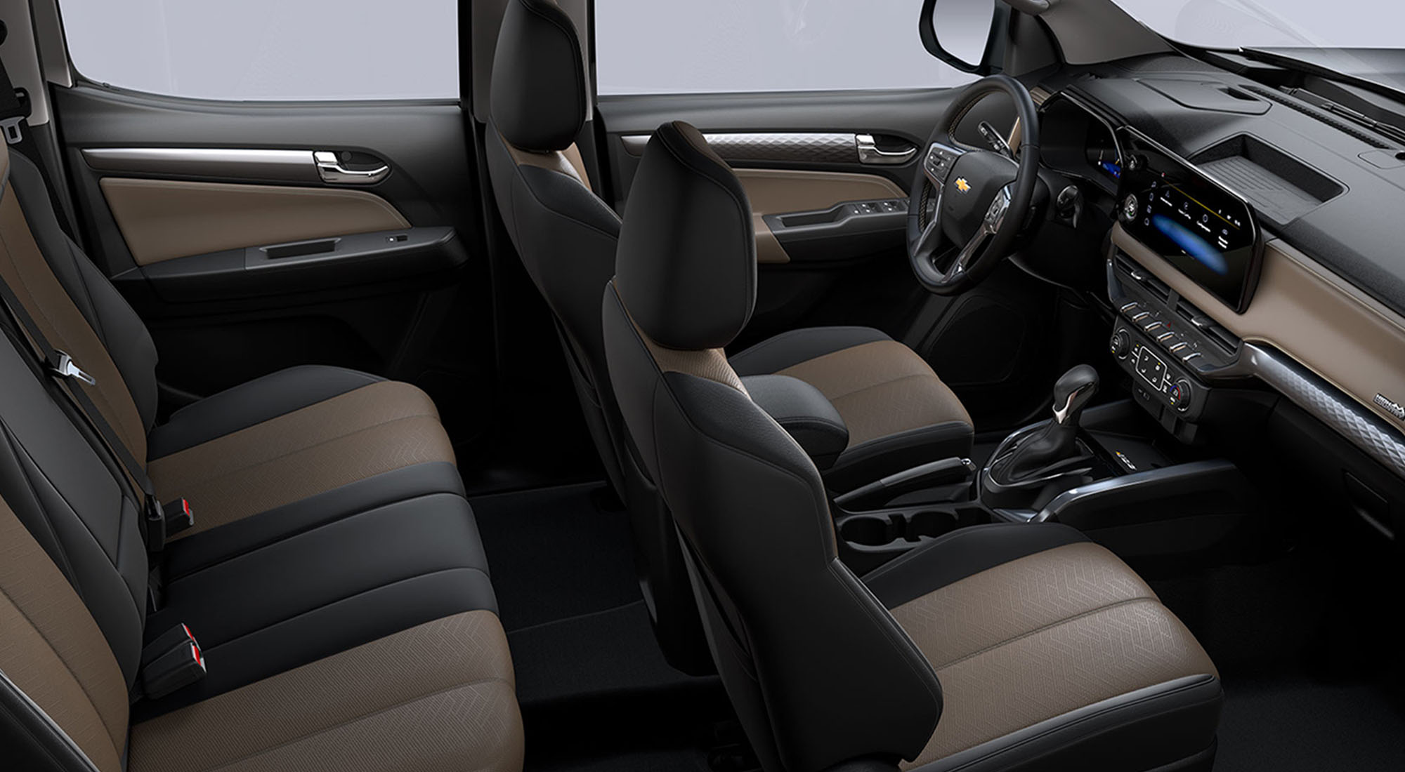 Interior de la Chevrolet Colorado con coginería en negro y café, volante y panel frontal
